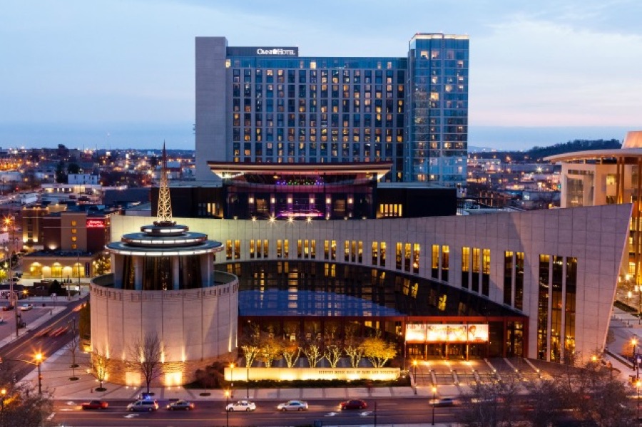 Country Music Hall of Fame and Museum building lit up at dusk